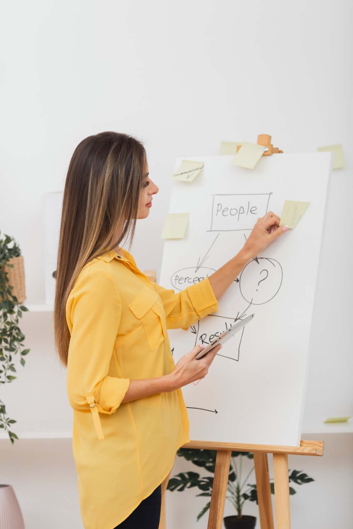 beautiful-woman-putting-sticky-notes